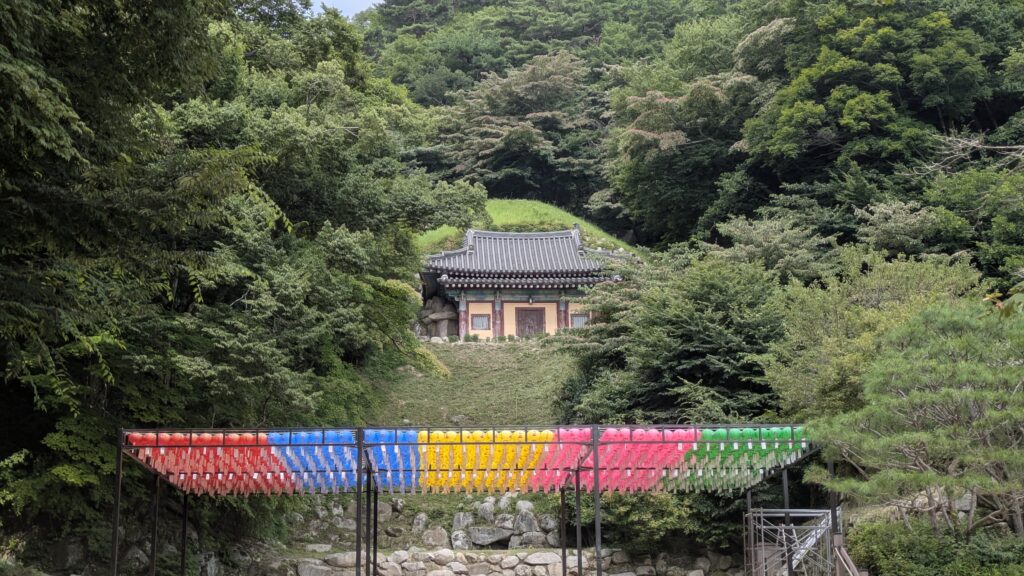 a Buddha statue is enshrined in seokguram rock.
